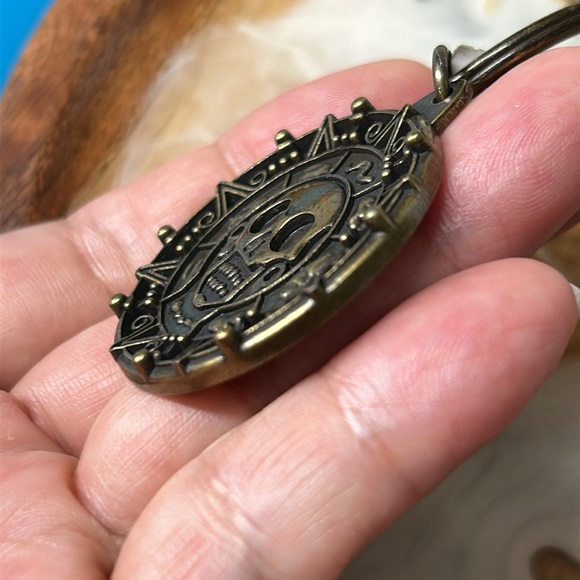 Disney | Accessories | Disney Pirates Of The Caribbean Brass Coin ...
